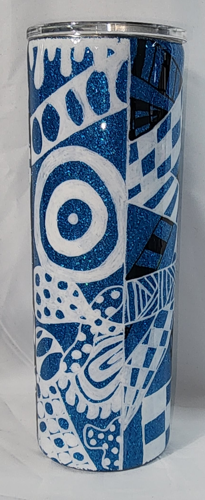 12-White and Black Tangle Art on blue glitter base 20oz Skinny Tumbler